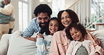 Family, face and care in home for love, bonding and laughing on sofa for funny joke or humor. Parents, children and together in living room for growth or trust, portrait and support in relationship