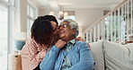 Woman, senior mom and kiss on sofa with love, bonding and care with laugh in family house. People, mother and daughter with hug, reunion and excited with connection in living room at home in Brazil