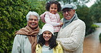 Happy, nature and face of children with grandparents in national park for holiday, getaway or adventure. Smile, portrait and kids with grandmother and grandfather in field for vacation in Colombia.