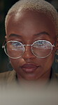 Business, black woman and online with reflection in glasses with pictures for career in social media management. Employee, closeup and working late in office for image review and campaign development