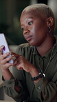 Black woman, phone and bored for online dating, swipe and choice in office at night with mobile app. Female person, smartphone and unhappy with decision for social media, relationship and search