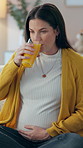 Pregnant woman, drink and juice to relax in home, citrus and prenatal vitamin for immune system. Female person, orange smoothie and thinking on maternity care, contemplating and glass of minerals