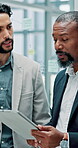 Office, men and business people with tablet in discussion for investment, update or review of equity. Corporate, employees and advice with tech for trade portfolio, solution and report on share price