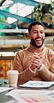 Business, man and happy with applause at cafe on meeting with success, achievement and congratulations. Male person, planning and smile with documents at coffee shop for strategy with finance report