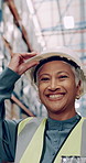 Engineer, face and warehouse for logistics, quality control and maintenance as supervisor with helmet. Mature woman, smile and portrait in inspection, industry and freight management for supply chain