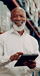 Tablet, warehouse manager and face of happy black man in shipping industry to check inventory. Factory, technology and portrait of mature supervisor working on app for logistics, export or inspection