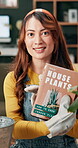 Plants, influencer and woman with book, nature and tips for followers in social media and recommendation. Apartment, content creator and girl with advice for gardening, promo and gardener with smile