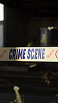 Building, barrier and yellow tape for crime scene, investigation or barricade for warning, danger or sign. Forensic inspection, crisis or blur of mystery with security for robbery, murder or no entry