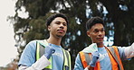 Nature, volunteer and men with garbage bag in park for environment, cleaning and community service. Sustainable, people and conversation with plastic in forest for NGO outreach, project and recycling