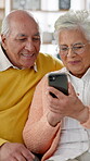 Senior couple, video call and communication on mobile phone with thumbs up in home for retirement. Elderly people, tech and wave in conversation with connection, together and bonding for virtual chat