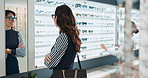 Woman, optometry and choosing spectacles for eye care, consultation and optometrist with shopping retail. Female person, glasses and option in clinic or ophthalmology center for size, frame and lens