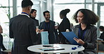 Business people, check in desk and service at conference, clipboard and conversation in modern office. Group, crowd and employee with person, communication and workshop for innovation, event and help