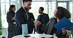 Business, people and handshake at onboarding seminar with opportunity, application or registration. Introduction, man and woman shaking hands, networking and connect at conference for company growth