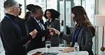 Welcome, handshake and business people at onboarding seminar with opportunity, info or registration. Introduction, man and women shaking hands, networking and connect at conference for company growth