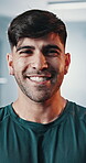 Gym, smile and face of man confident in fitness, physical activity or exercise for sports commitment. Club dedication, portrait and happy personal trainer ready for hard work, training or workout