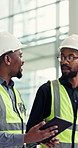 Engineering, men and business people with tablet, conversation and inspection with protection. Safety, coworkers and employees with technology, internet and communication for development and app