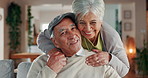 Elderly couple, face and hug in home for support, commitment and love for comfort in lounge. Senior people, sofa embrace and romance in retirement portrait, security and bonding for trust in marriage