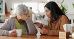 Sad, senior mother and daughter with compassion in crying, support and grief at nursing home or retirement. Elderly person, woman and soothing with tissue or empathy for love, care or communication