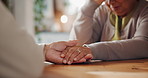 Senior people, compassion and support with holding hands, assistance or grief in nursing home or retirement. Elderly man, woman and wellness for empathy in living room for love, care or communication