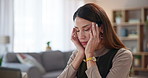 Frustrated woman, headache and anxiety with stress in debt, bankruptcy or depression at home. Female person, freelancer or remote worker with migraine or strain from pressure or fatigue at house