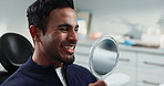 Dental, smile and man with mirror, healthcare and proud with teeth whitening, appointment and wellness. Confidence, person and guy with reflection, oral care and fresh breath with checkup and results