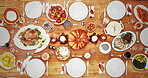 Table, celebration and food for dinner, house and wine for bottle for thanksgiving, event and above. Home, holiday and feast for festive season, Christmas and turkey for hosting, drinks and alcohol