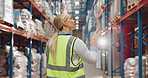 Logistics, pointing and woman in warehouse with tablet for online checklist for export distribution. Inventory management, search or person in factory on digital app for inspection in plant from back