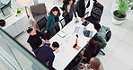 Business people, meeting and technology for collaboration, discussion and company development in office. Staff, diversity and management team in workplace for partnership, communication and top view