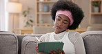 Black woman, tablet or creative on sofa for remote work, editing or drawing at home. Freelance graphic designer, tech or idea on couch for logo draft, digital pen or sketch with online inspiration