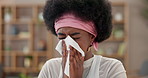 Sick, black woman and blowing nose with tissue for flu, cold or bad sinus reaction at home. Young African, female person or hayfever season with toilet paper for allergy, influenza or sneeze at house