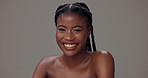 Black woman, portrait and laugh in studio for skincare, confidence or natural beauty. happy, clear skin or person on gray background with cosmetics, luxury glow or dermatology for wellness in Nigeria