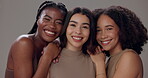 Women, face and skincare with diversity in studio for dermatology, beauty or solidarity on gray background. Friends, skin and inclusion with support for self care, cosmetics or facial transformation
