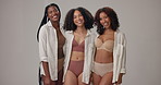 Underwear, happy and face of women in studio for wellness, beauty and body positivity. Diversity, lingerie and portrait of people in bra with confidence, self love and inclusion on gray background