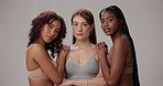 Underwear, beauty and face of women in studio for wellness, natural skin and body positivity. Lingerie, group and portrait of people in bra with confidence, self love and inclusion on gray background