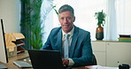 Office, portrait and mature man at laptop with smile, confidence and business plan at financial agency. Risk management, admin and happy consultant at desk with computer for online schedule email