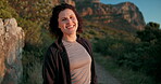 Mountain, fitness and face of woman with smile for outdoor exercise, wellness and run at sunset. Happy, athlete and person with confidence in nature for healthy body, workout and training in Austria