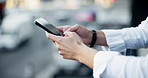 Hands, phone and business person in city for networking, scroll or social media. Mobile, typing email and professional finance agent on internet for communication, info and news notification closeup