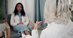 Psychologist, women and talking to patient with clipboard for mental health consultation and healing advice. Counseling, hands and review for psychotherapy, screening feedback and healthcare support