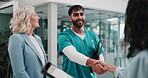 Business people, happy and handshake with nurse in clinic for healthcare funding success and agreement. Hospital director, documents or shaking hands with medical professional for NGO contract deal