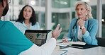 Data, healthcare and laptop with people in boardroom of hospital for meeting, planning or research. Doctors, information and nurses with professional medicine group in clinic for education or review