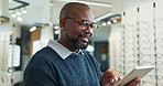 Black man, optometrist and tablet with eyewear at store for eye exam results, medical prescription and retail inventory. Smile, male person and digital for assessment schedule, online service and web