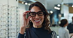 Woman, optometry and face with glasses for eye care, medical professional or optometrist consultation. Female person, spectacles and portrait in clinic or ophthalmology center for size, frame or lens