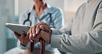 Doctor, patient and hands with tablet for elderly care, consultation or healthcare advice at hospital. Closeup, medical employee and senior with cane or technology for health consulting in retirement