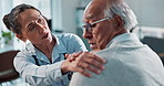 Woman, doctor and elderly patient with shoulder pain for consultation, healthcare or exam at hospital. Female person, medical employee or health consultant with senior client for injury, pain or ache