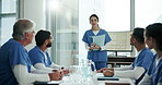 Presentation, meeting and teamwork with woman in hospital boardroom for mpox protocol, research and medical cure. Medicine, collaboration and planning with group of doctors in healthcare workshop