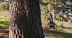 Ebike, cycling and friends with people in nature for sustainability, travel and relax. Peace, environment and speed with ride on forest path trail for challenge, carbon footprint and transportation