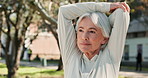 Thinking, senior or woman in park stretching arms to start running, outdoor workout or training in nature. Flexible, retirement and elderly runner in fitness routine for warm up, exercise and health