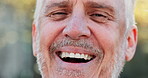 Face, laughing and smile of old man outdoor in nature for adventure, fitness or hiking closeup. Exercise, portrait and retirement with funny senior person in forest or park to explore New Zealand