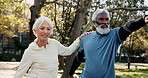 Old people, fitness and stretching legs in nature, outdoor warm up and training in park for cardio. Senior couple, support and flexibility for muscle wellness in retirement, preparation and talking