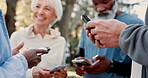 Fitness, hands and phone with senior people outdoor in forest for challenge or performance tracking. App, exercise or information sharing with mature friends in nature or park for cardio training